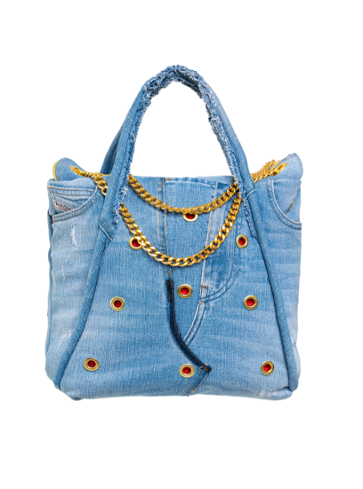 Denim handbag with gold chain detail on a white background